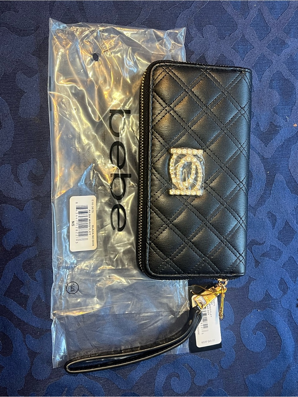 bebe Black Quilted Card Holder Wristlet with Rhinestone Emblem